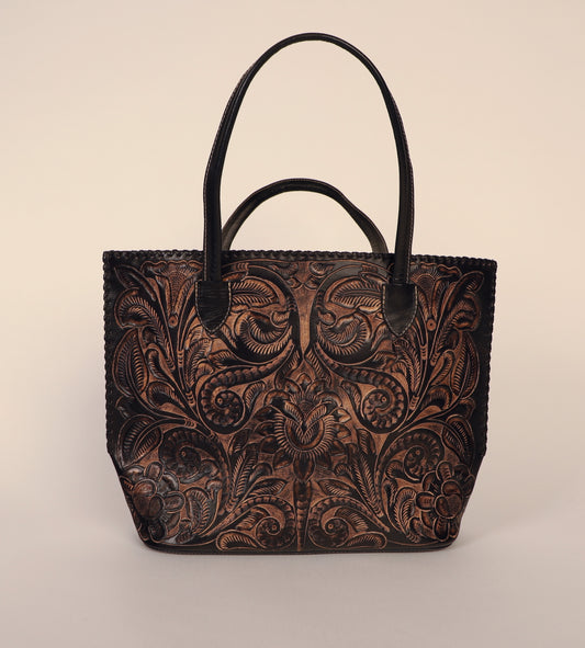 Over-sized authentic leather tote bag with traditional Mexican design etched on both sides. Fully lined with suede. Front view.